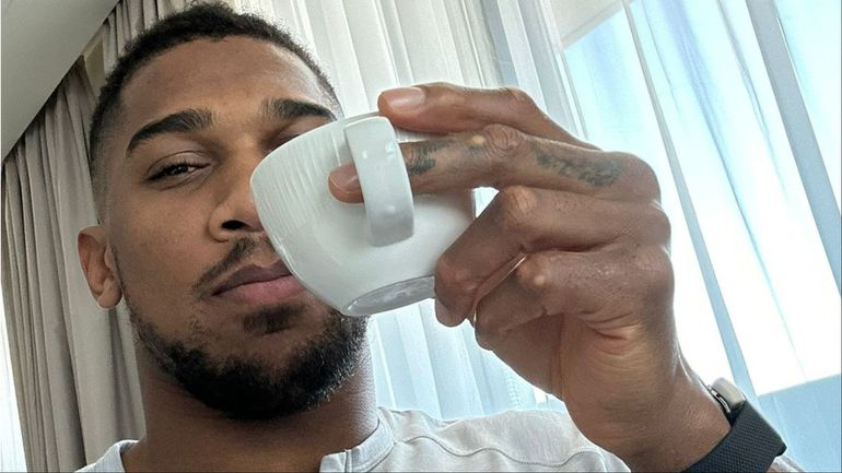 Nigerian-born Anthony Joshua shows off coffee ahead of his boxing return.