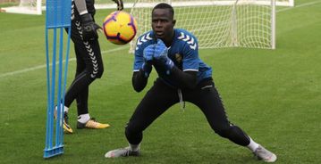 Senegalese goalkeeper Cheikh Kane Sarr sent off after fighting a fan over alleged racist comments in Spain