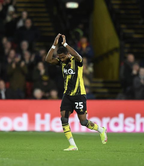 Emmanuel Dennis celebrates for Watford.