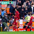 Liverpool survives Tottenham's late comeback