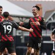 Manchester City celebrate a Premier League goal vs Fulham.