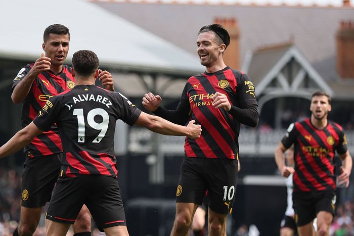 Manchester City celebrate a Premier League goal vs Fulham.