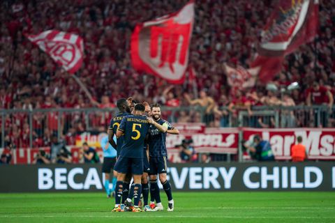Real Madrid celebrate after Vinicius Junior's first goal agianst Bayern Munich
