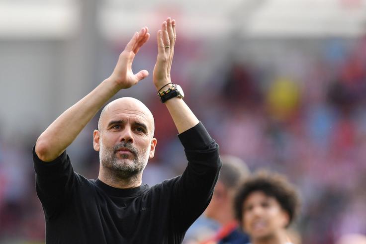 Pep Guardiola wins treble with Man City