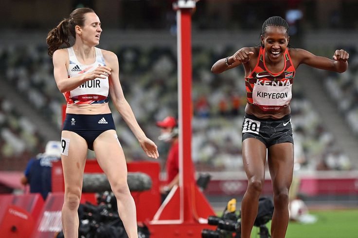 Faith Kipyegon (R) of Kenya and Laura Muir of the Great Britain react after the Women s 1500m Final at the Tokyo 2020 Olympic Games