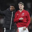 Amad Diallo (16) gestures Manchester United forward Alejandro Garnacho (17) fans during the Manchester United FC v Olympique Lyonnais UEFA Europa League Quarter-Final 2nd leg match at Old Trafford