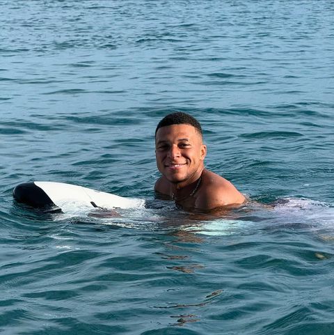 Mbappe beamed with smiles after taking a dive into the ocean