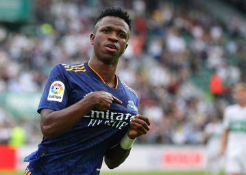 Vinicius double gives Madrid victory over 10-man Elche