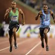 ustin Gatlin gives former track rival Asafa Powell his flowers