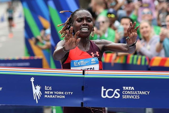 Sharon Lokedi cuts the tape at the New York City Marathon