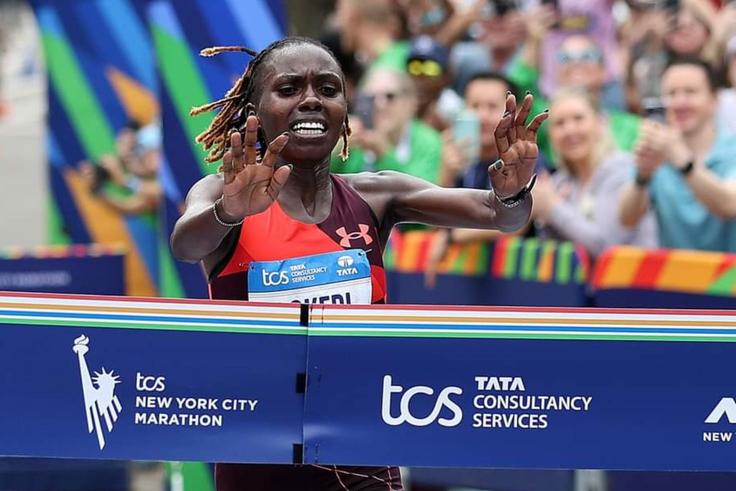 Sharon Lokedi cuts the tape at the New York City Marathon
