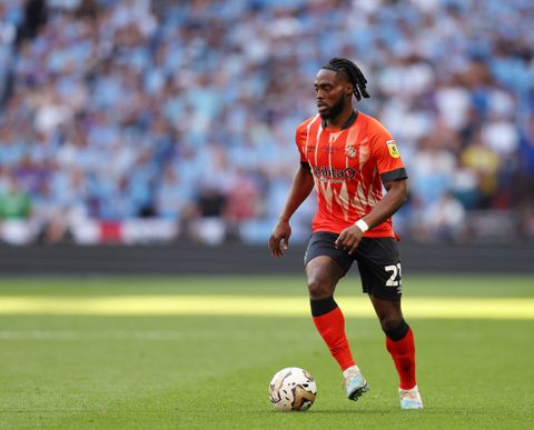 Nigerian midfielder  Fred Onyedinma for Luton Town