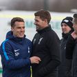 Steven Gerrard  and Scott Parker during a match between both their sides.