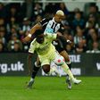 Newcastle United v Arsenal - Premier League Joelinton of Newcastle United and Bukayo Saka of Arsenal in action during the Premier League match between Newcastle United and Arsenal at St. James s Park