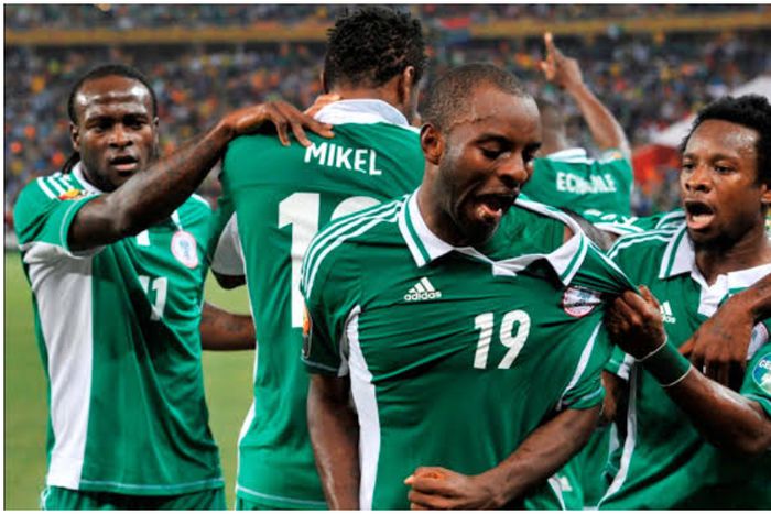 Super Eagles players led by Sunday Mba celebrate the AFCON win 10 years ago.