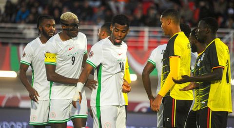 Victor Osimhen and Raphael Onyedika in action against Uganda || Image credit: Imago