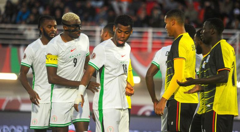 Victor Osimhen and Raphael Onyedika in action against Uganda || Image credit: Imago