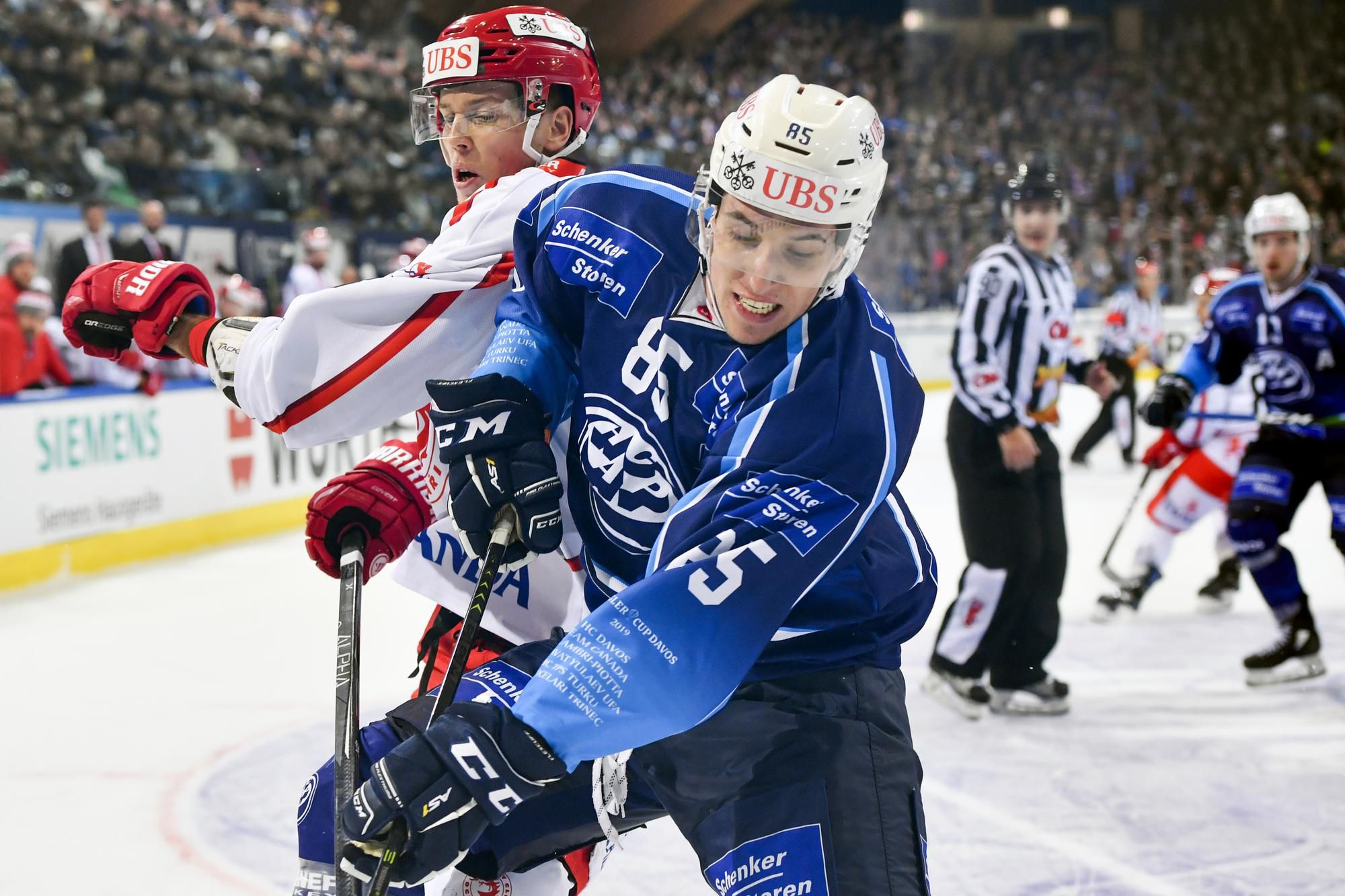 Spengler Cup: HC Ambri-Piotta - HC Oceláři Třinec (Marco Mirandam Martin Gernát)