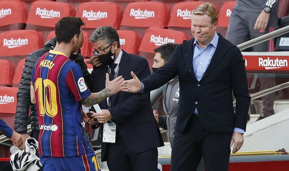 Ronald Koeman a Lionel Messi.