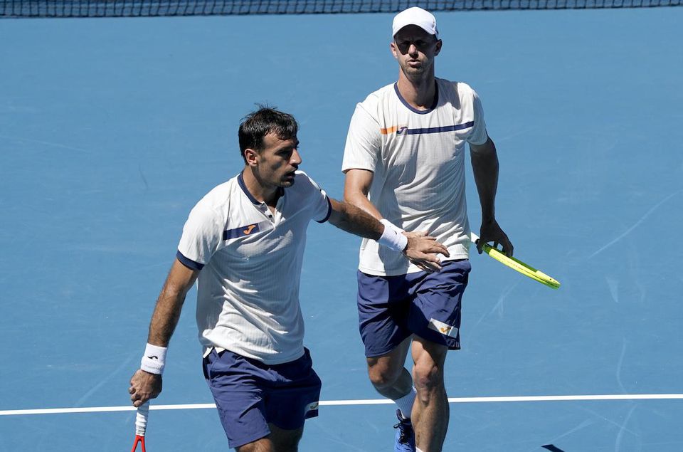 Slovensko-chorvátsky tenisový pár Filip Polášek a Ivan Dodig.