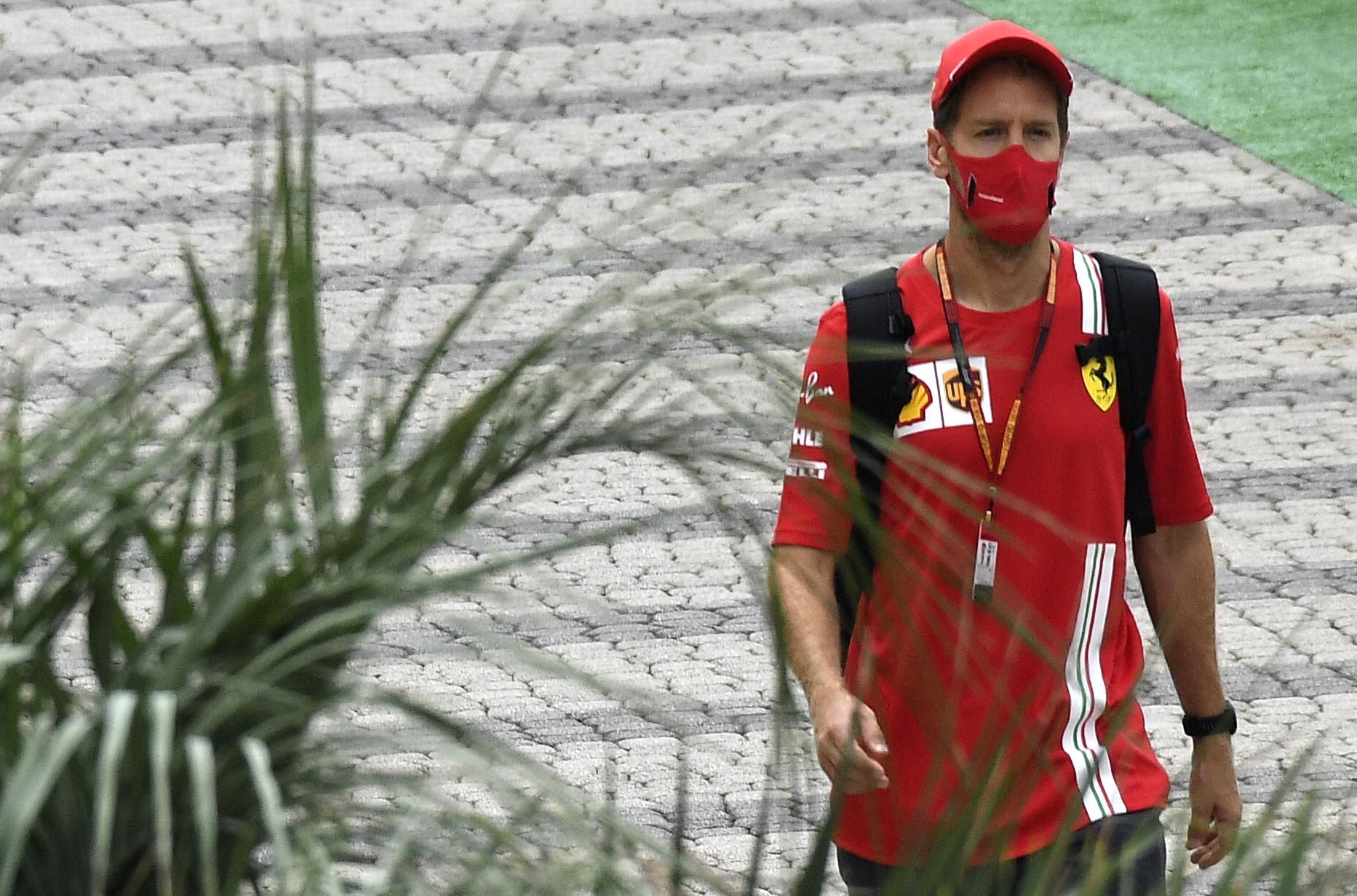 Jazdec Ferrari Sebastian Vettel.