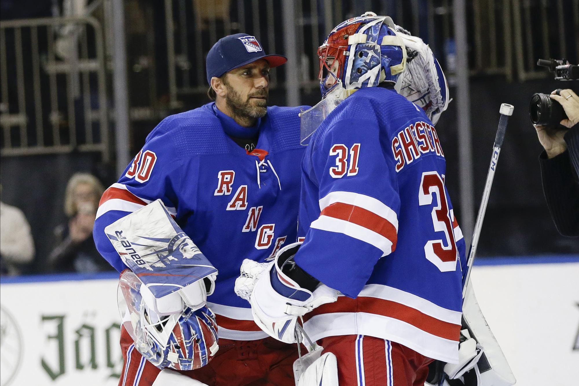 Henrik Lundqvist a Igor Šestorkin.