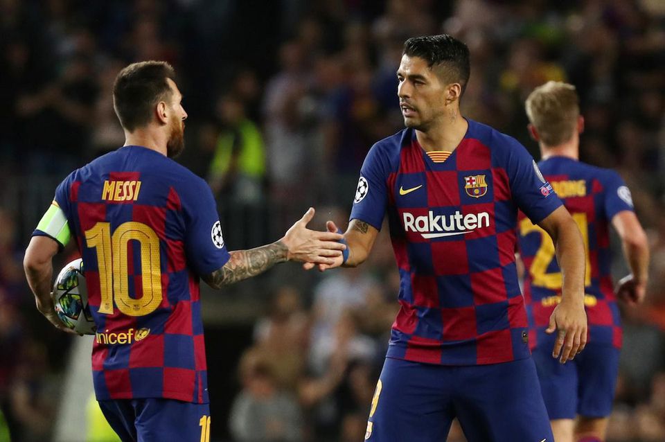 Lionel Messi a Luis Suarez.