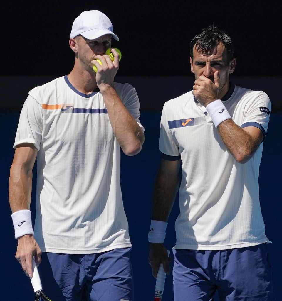 Slovensko-chorvátsky tenisový pár Filip Polášek a Ivan Dodig.