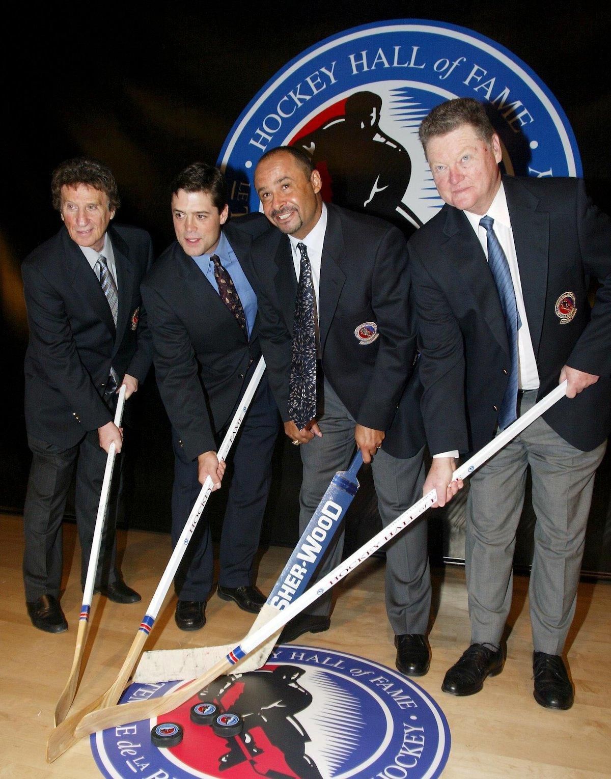 Mike Ilitch, Pat LaFontaine, Grant Fuhr a Brian Kilrea.