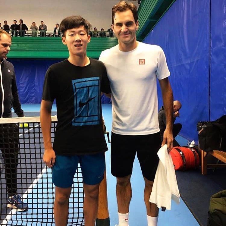 Ceng Ťun-Sin s Rogerom Federerom.