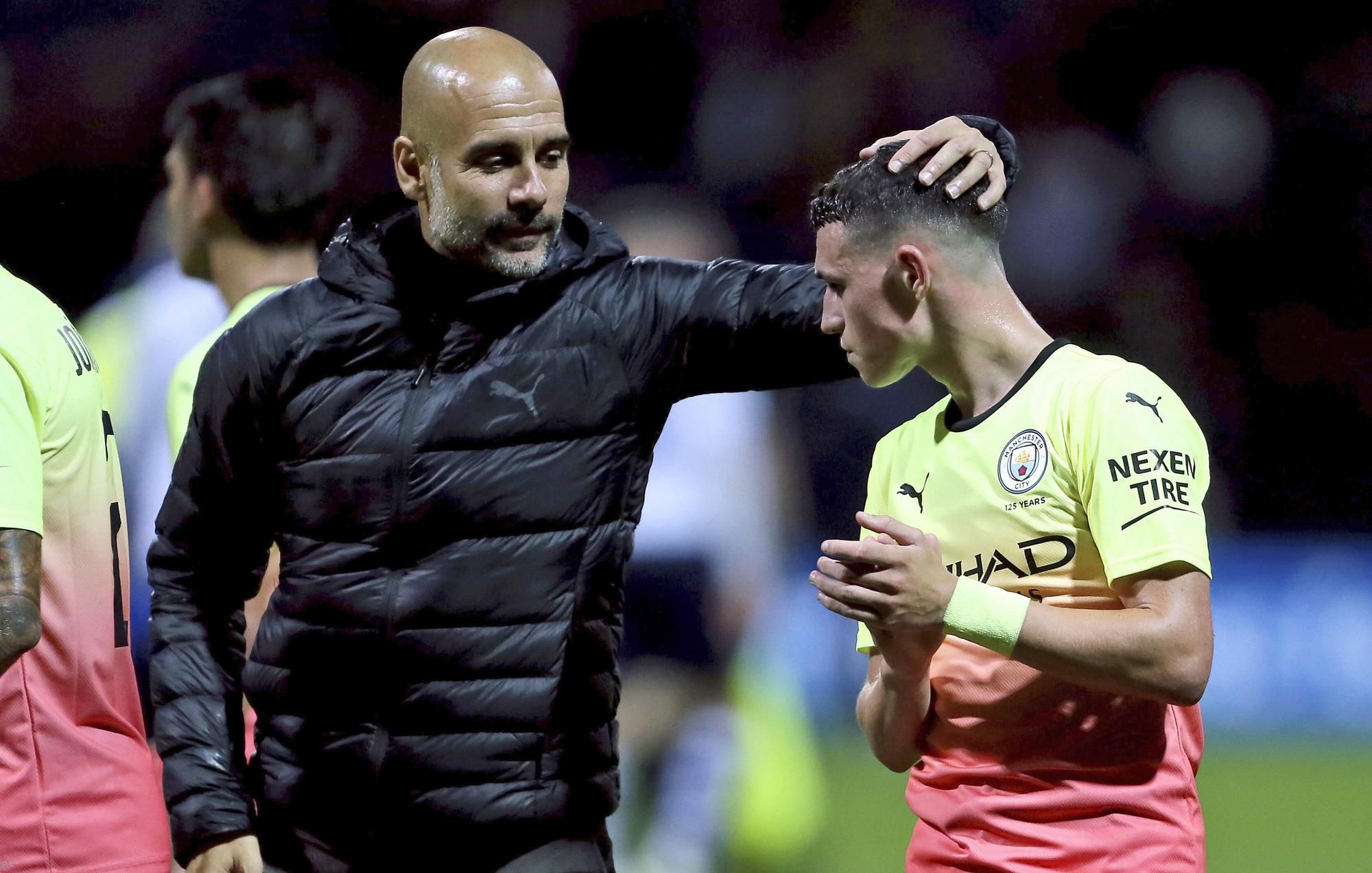 Pep Guardiola a záložník Phil Foden