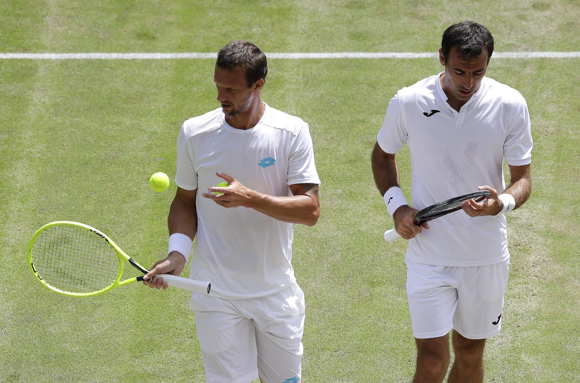 Slovensko-chorvátska dvojica Filip Polášek (vľavo), Ivan Dodig