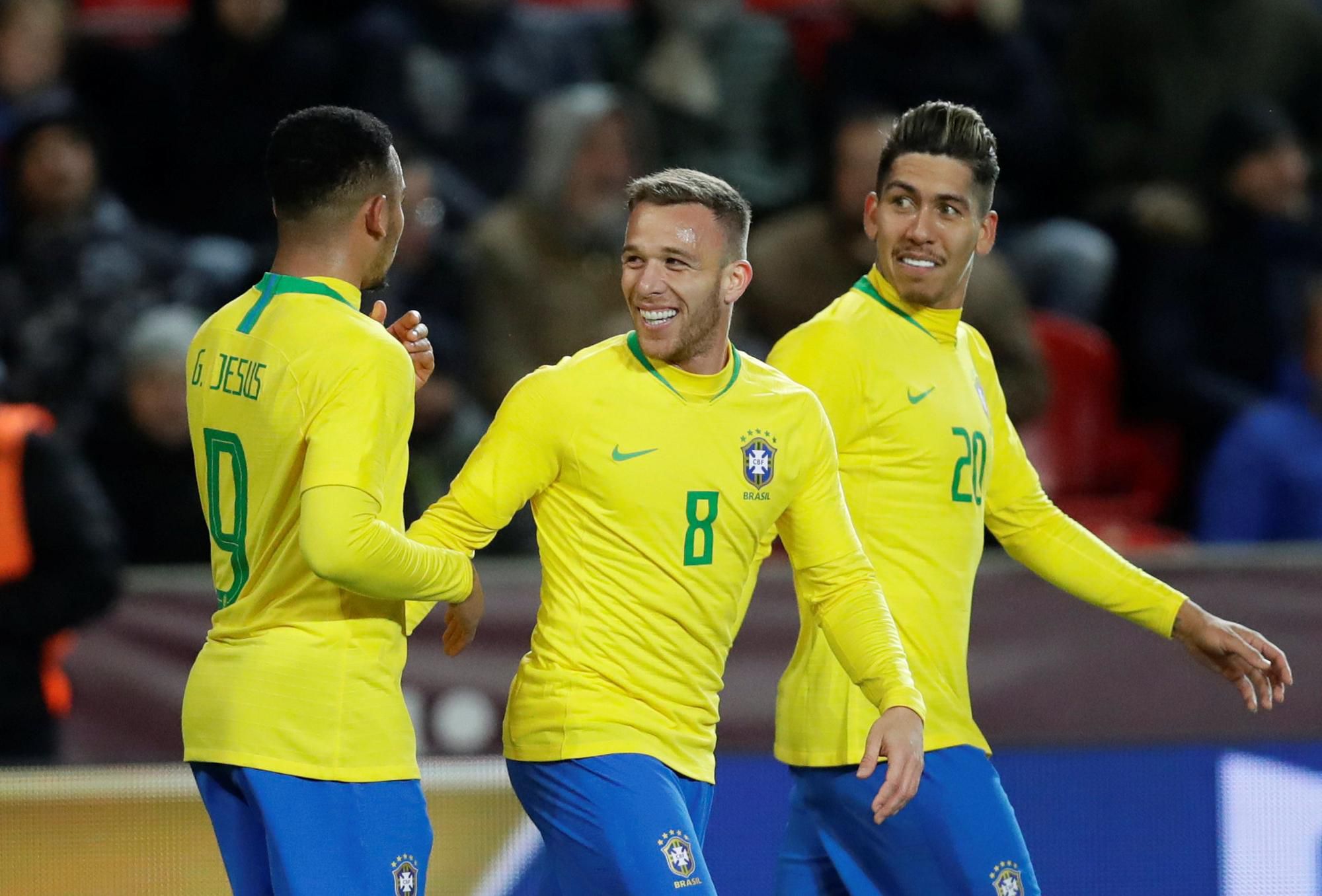 Gabriel Jesus, Arthur a Roberto Firmino (všetci Brazília).