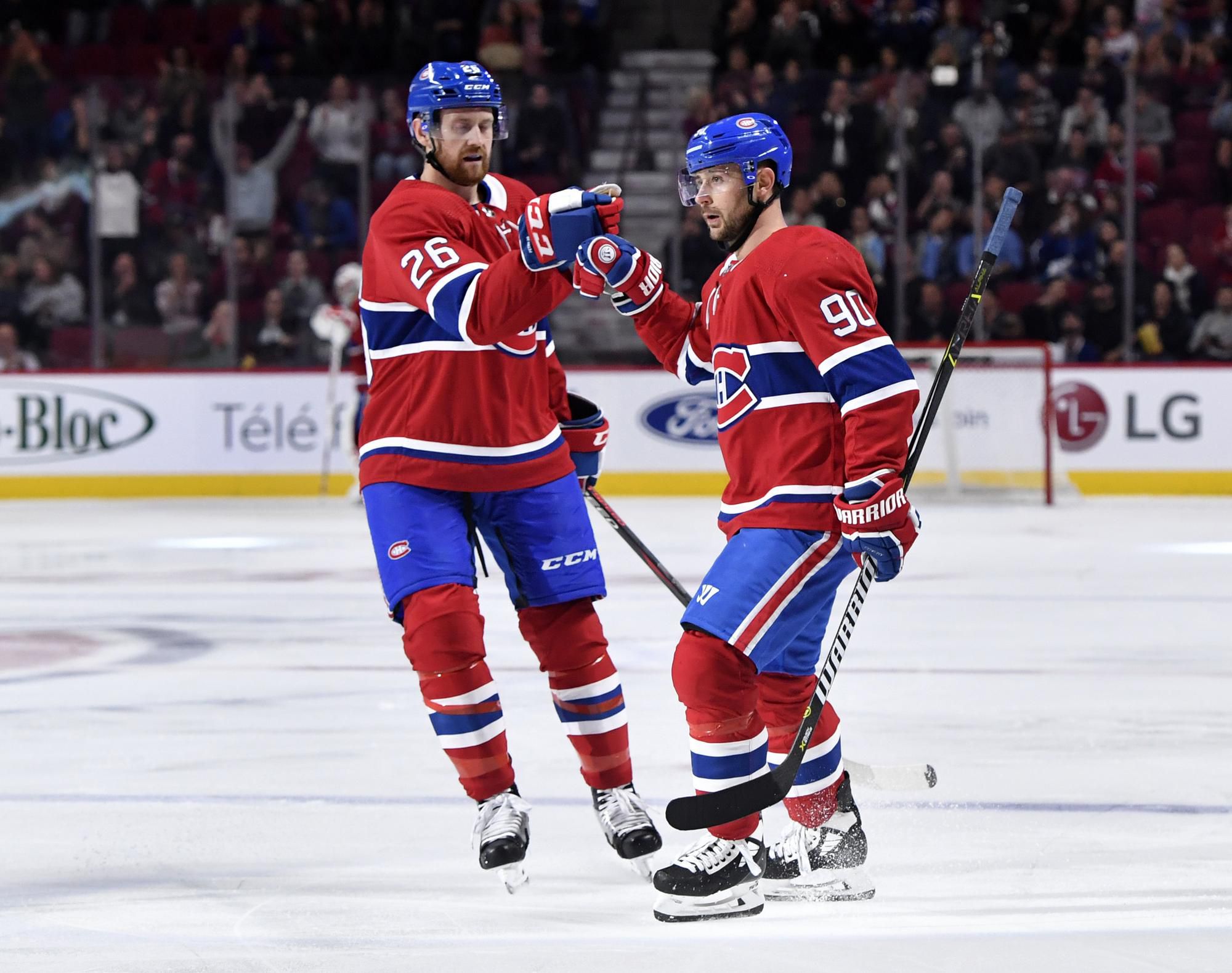 Tomáš Tatar v drese Montrealu Canadiens a Jeff Petry.