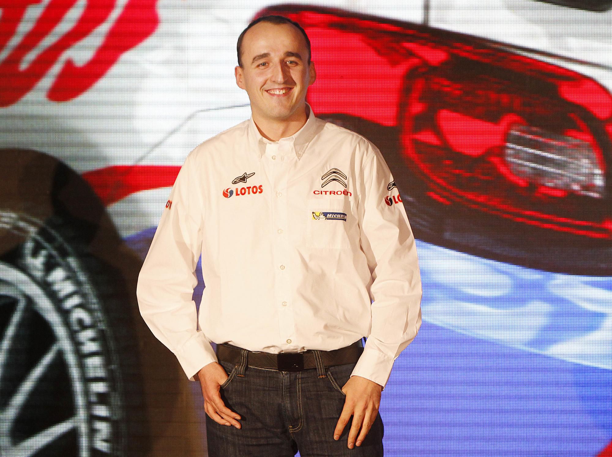 Robert Kubica počas tlačovej konferencie 14. marca 2013 vo Varšave