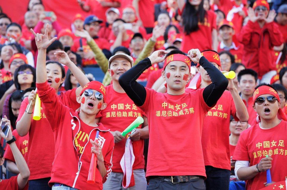 Čínski fanúšikovia.