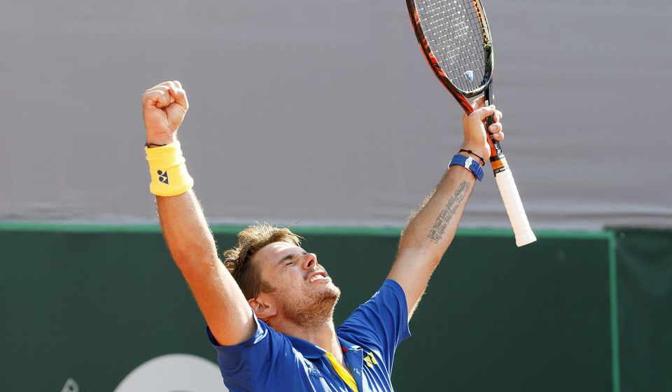 Švajčiarsky tenista Stan Wawrinka sa raduje po víťazstve