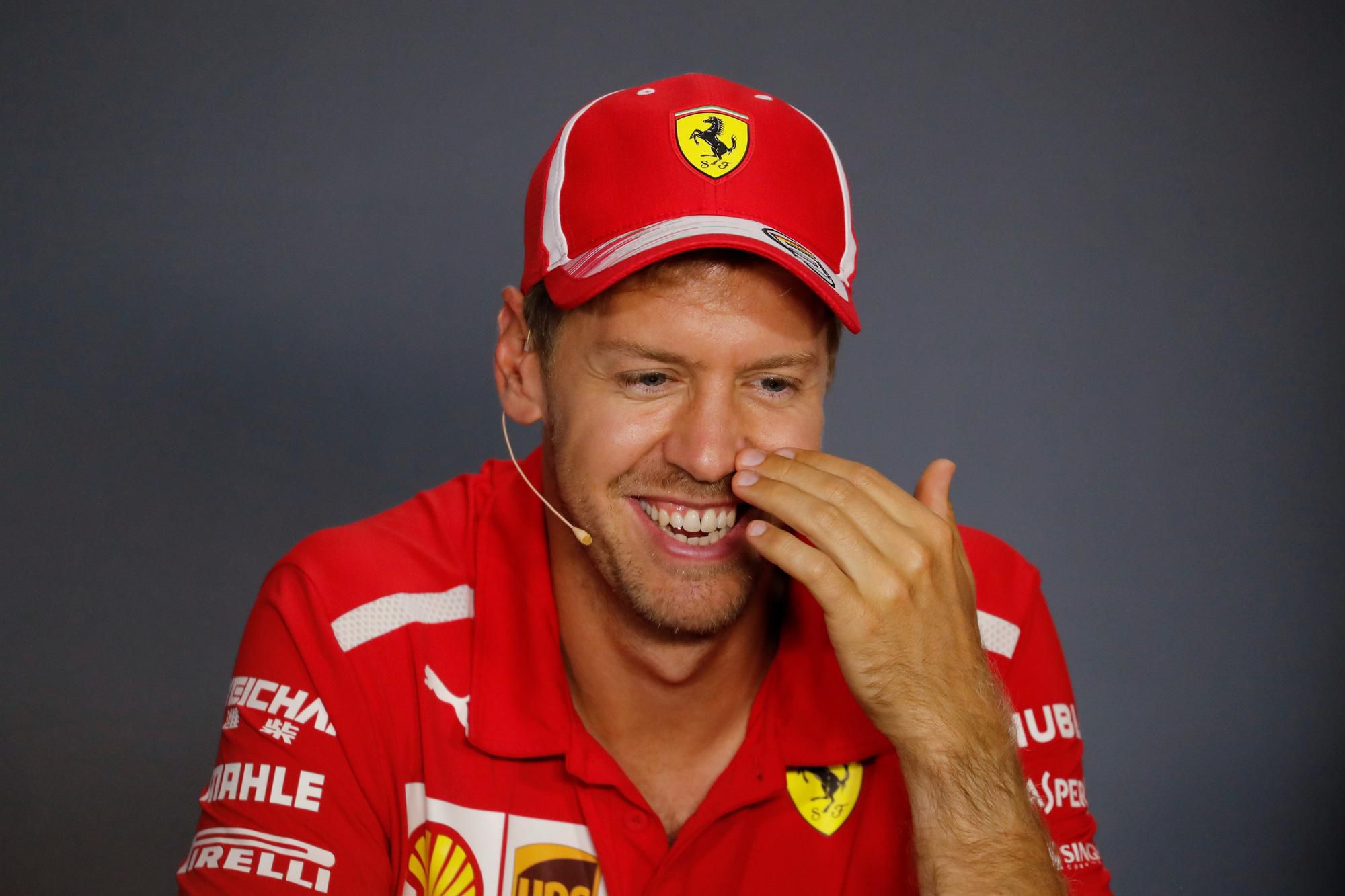 Jazdec stajne Ferrari Sebastian Vettel.