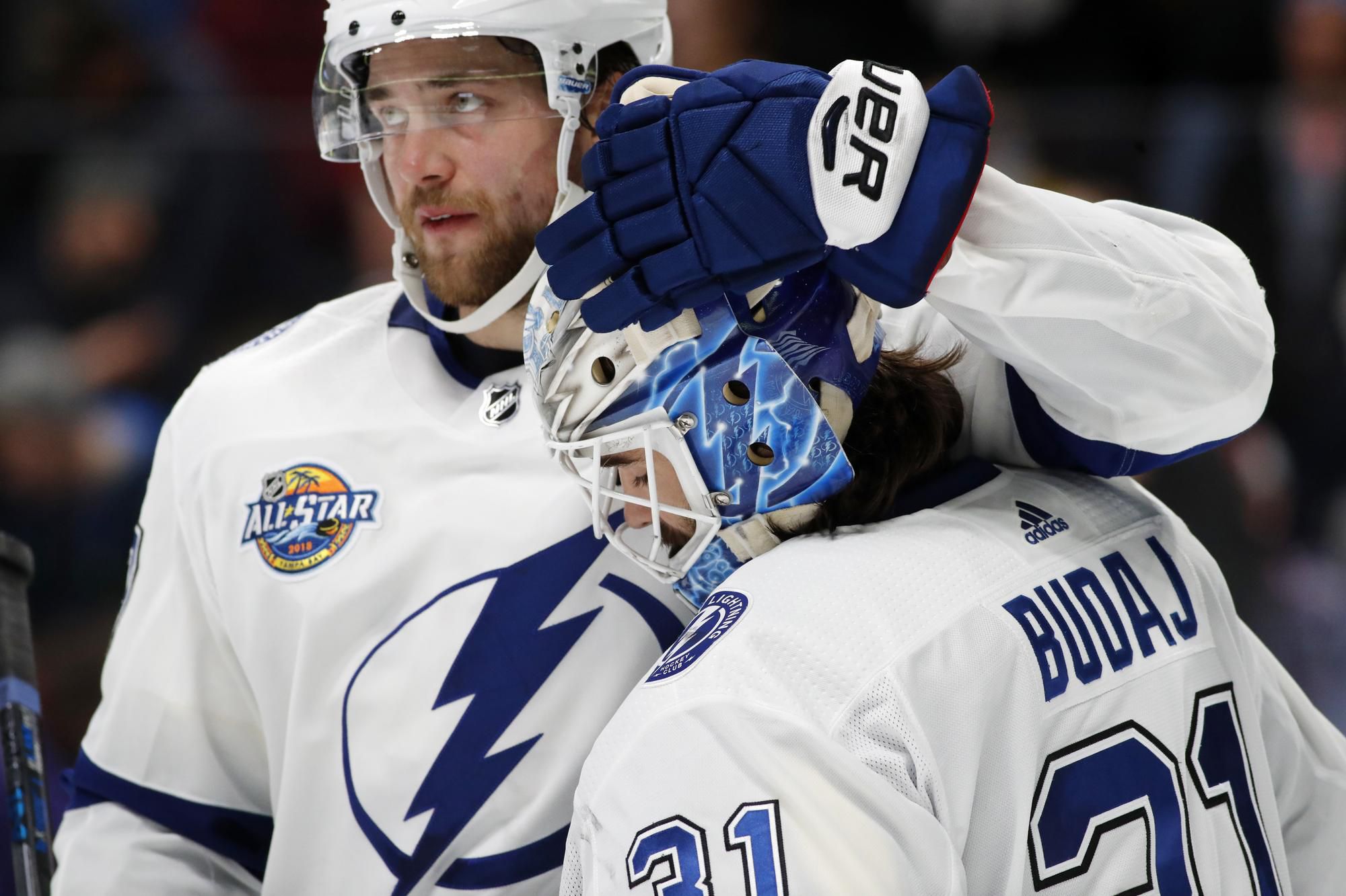 Victor Hedman a slovenský brankár Peter Budaj.