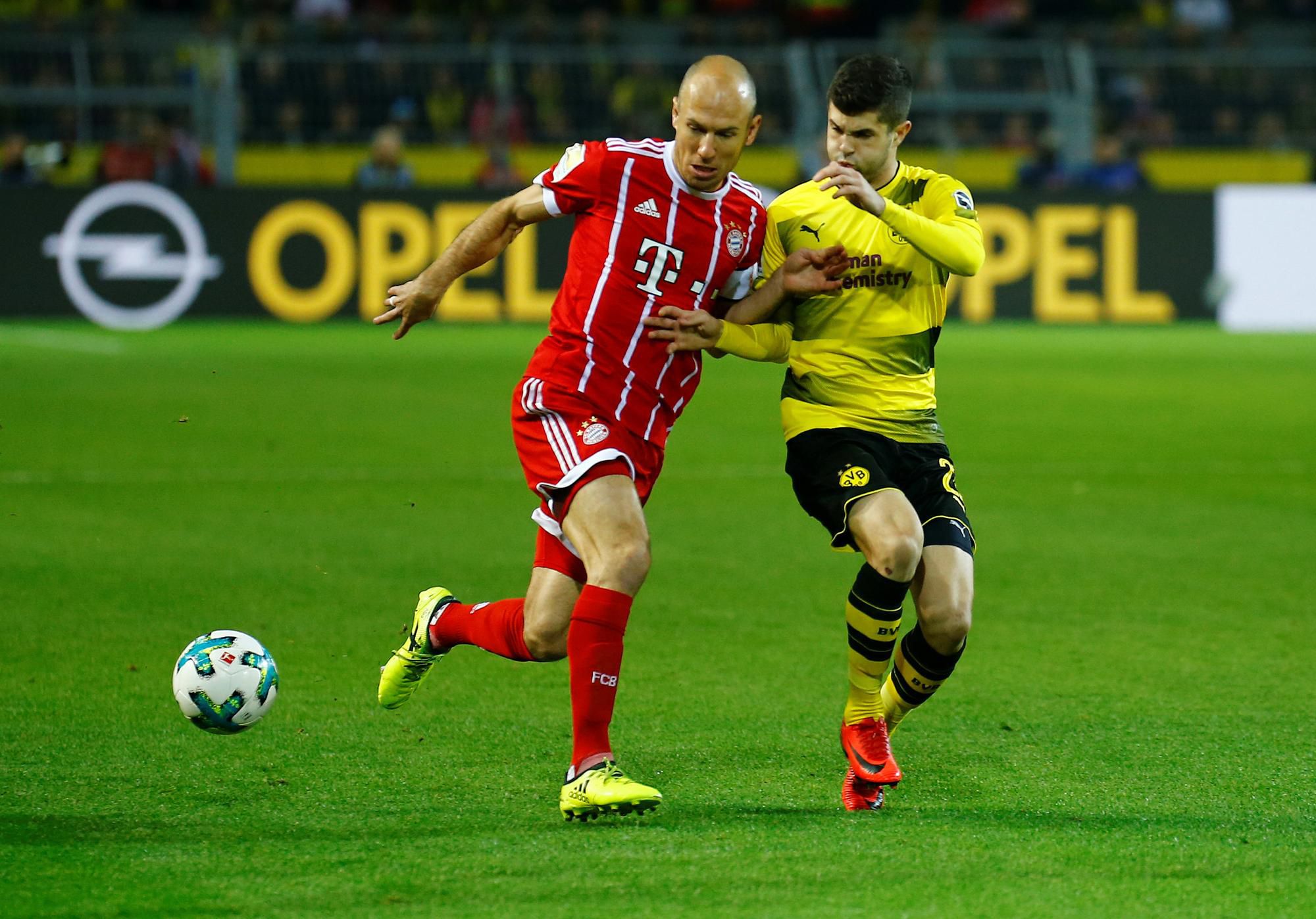 Arjen Robben a Christian Pulisic.