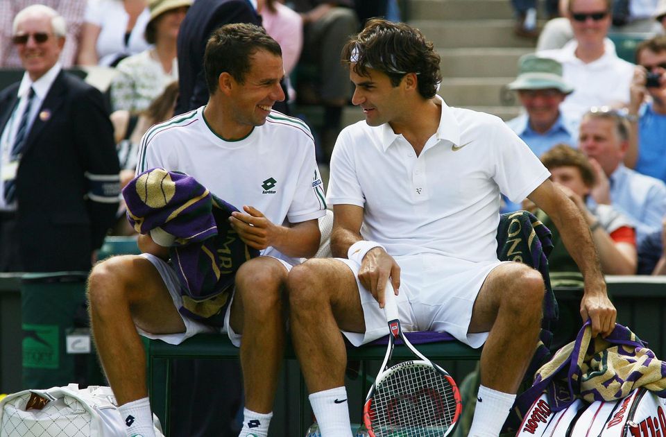 Dominik Hrbatý a Roger Federer na Wimbledone v roku 2008