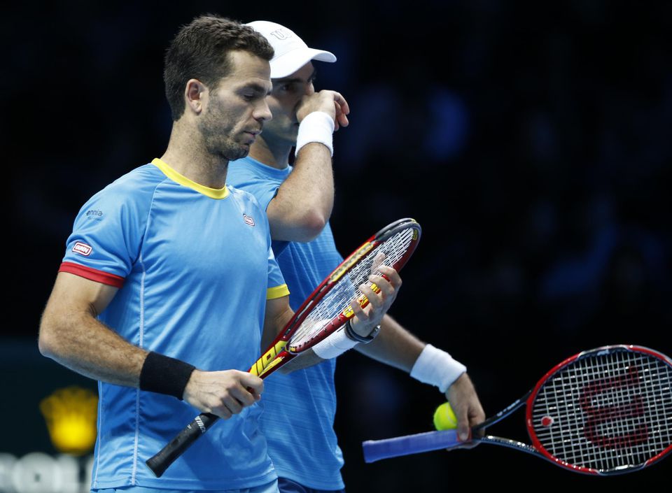 Holandsko-rumunský pár Jean-Julien Rojer (vpravo),  Horia Tecau