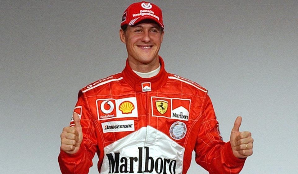 Michael Schumacher, Ferrari, cervena kombineza, palce hore, archivne foto