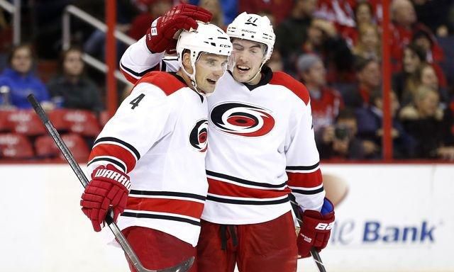 Andrej sekera justin faulk carolina golova radost vs washington dec2013 reuters