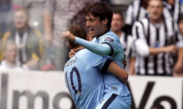 David silva a edin dzeko man city golova radost vs newcastle aug2014 reuters