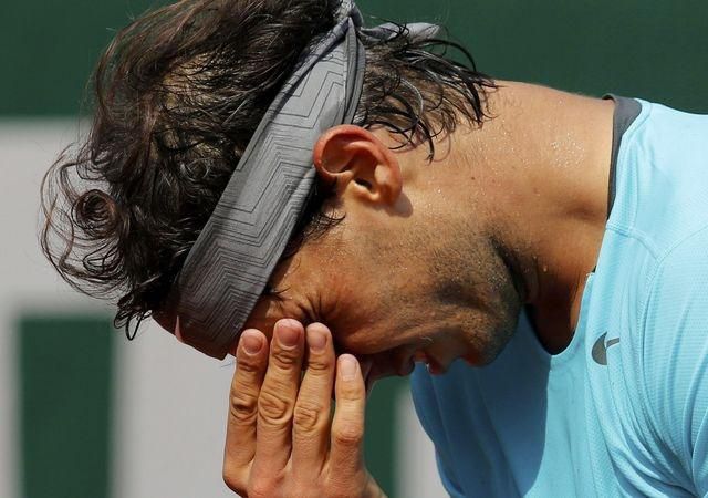 Rafael Nadal ilustracka hlava dole reuters