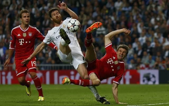 Real madrid bayern xabi alonso mandzukic apr14 reuters