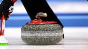 Curling cajnik ilustracne foto