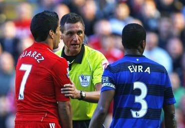 Luis Suarez a Patrice Evra