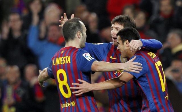 Messi iniesta pedro barcelona feb12 reuters